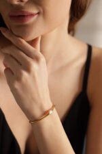 Sterling silver bracelet with pearl detail, perfect for women’s minimal jewelry collection.