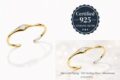 Minimalist open cuff bracelet in 925 sterling silver with gold plating.