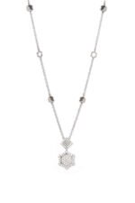 Sterling silver HEXA necklace with geometric hexagon pendant, perfect for elegant everyday wear.