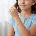 Delicate silver bracelet with bird charm for kids and teens.