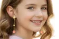 Delicate hanging flower earrings for kids with pink and gold accents.