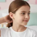 Cute gold angel earrings for kids, delicate and safe for children.