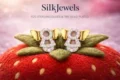 Delicate gold angel earrings with cubic zirconia for children.