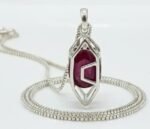 Sterling silver pendant with a deep red natural ruby gemstone. Perfect for minimal, sophisticated je.