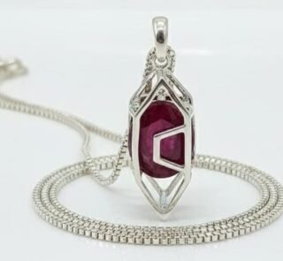 Sterling silver pendant with a deep red natural ruby gemstone. Perfect for minimal, sophisticated je.