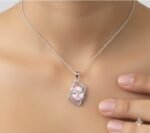 Elegant pink tourmaline gemstone pendant on a delicate silver chain.
