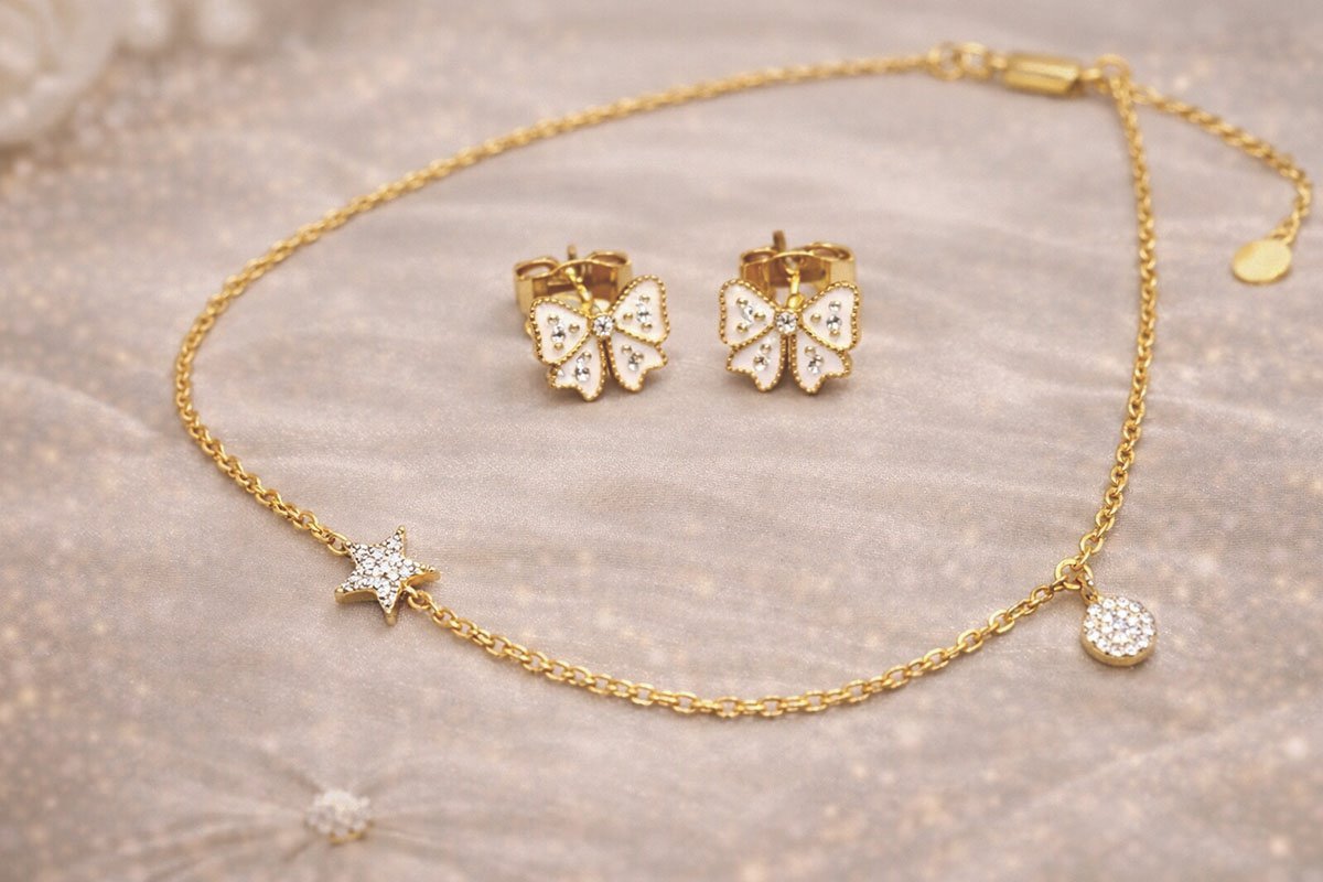Elegant gold butterfly jewelry set with star and heart charms, ideal for women, teens, and kids.