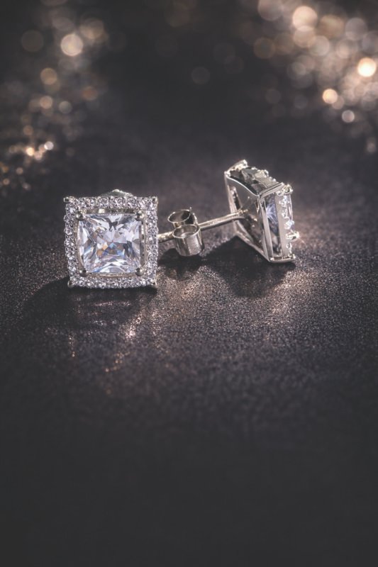 Sterling silver square stud earrings with sparkling cubic zirconia for women and teens.