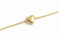 Elegant gold heart necklace with a small diamond accent for women and teens.
