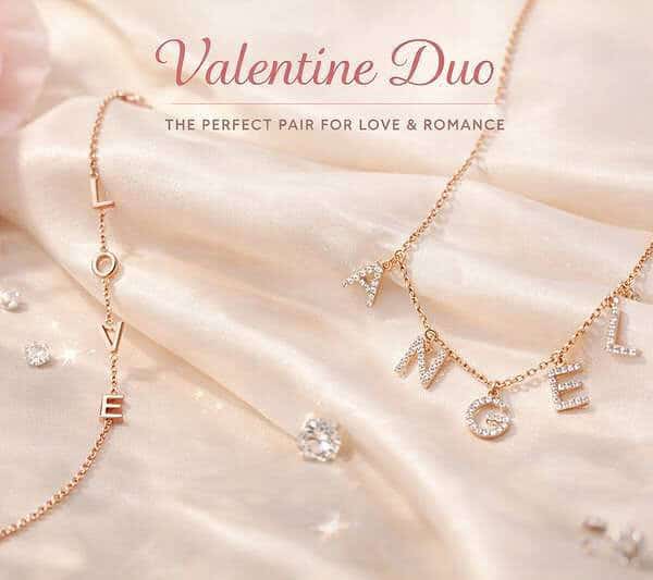 Elegant Valentine jewelry set with gold-plated silver necklaces and letter pendants.