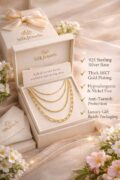 Gold rope chain necklace displayed in SILKJEWELS gift box with flowers.