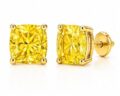 Elegant yellow lab grown diamond stud earrings in gold and silver settings.