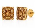 Elegant cushion cut earrings with gold prongs and backing.