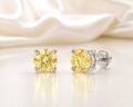 Elegant yellow lab grown diamond stud earrings in sterling silver setting.