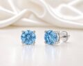 Sterling silver stud earrings with blue lab-grown diamonds for women and teens.
