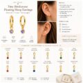 Gold hoop earrings with purple birthstone for women and teens.