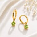 Elegant gold hoop earrings with green gemstones for women and teens.