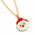 Gold tone Santa Claus pendant necklace with red hat and white beard.