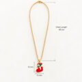 Gold Santa Hat pendant on chain, 45 cm length.