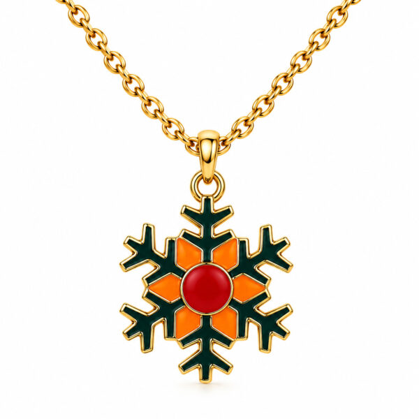 Gold snowflake pendant with red and orange enamel accents on chain.