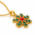 Gold snowflake pendant with red and orange accents on a chain.