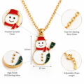 Snowman pendant on gold-plated chain with red scarf.