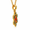 Elegant snowflake pendant necklace in gold with colorful enamel details.