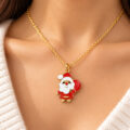 Gold chain necklace with Santa Claus pendant for holiday wear.