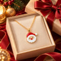 Gold Santa head pendant on gold chain in a jewelry box.